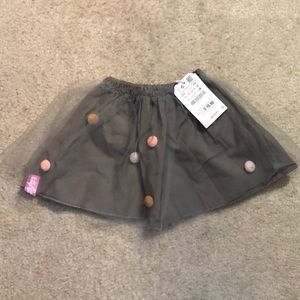 Cute skirt with polka dots and tulle.